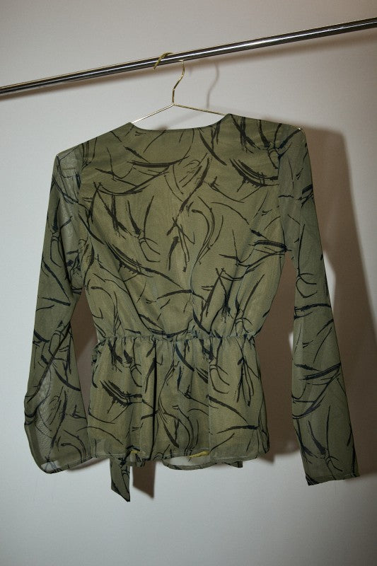 Surplice Long Sleeve Waist Tie Abstract Top