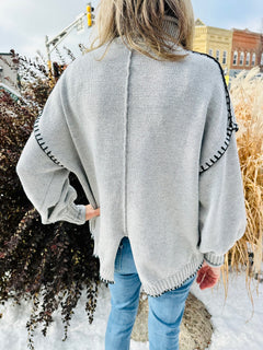 The Annie Mock Neck Sweater.